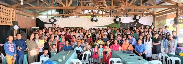 The congregation of House of Prayer Fundamental Baptist Church gathered together in their open-air pavilion